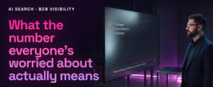 A B2B Brand marketing expert reviews data on a screen